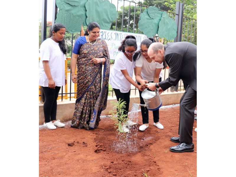 Planting the PASCH Plant by the German Delegates.